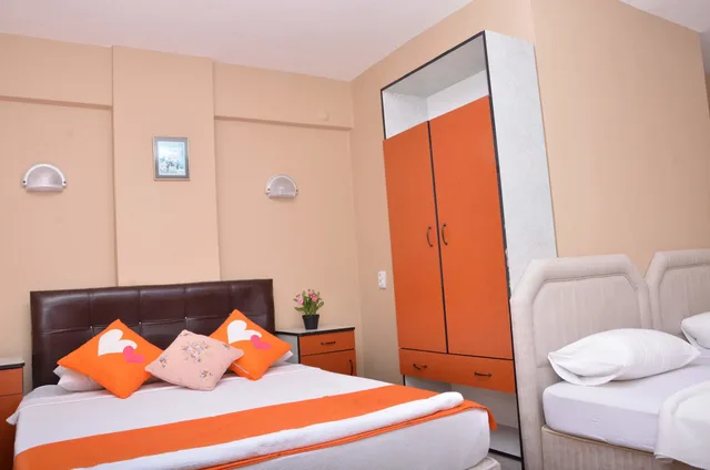 غرفة رباعية بسرير مزدوج وسريرين منفصلين، Nil Hotel 1/9