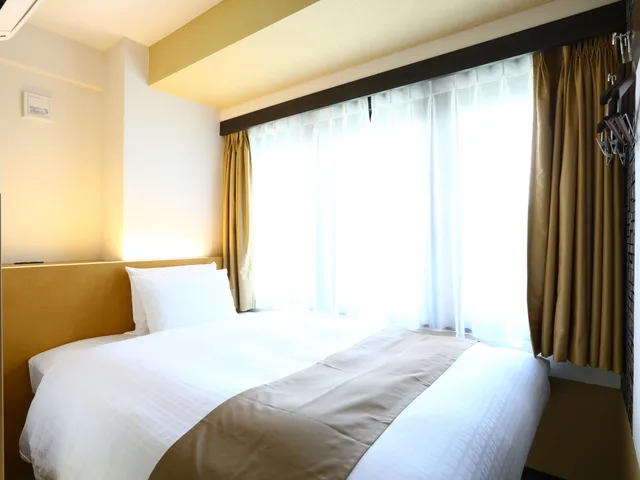 غرفة بسرير مزدوج في طابق مرتفع، KOKO HOTEL Ueno Station 1/2