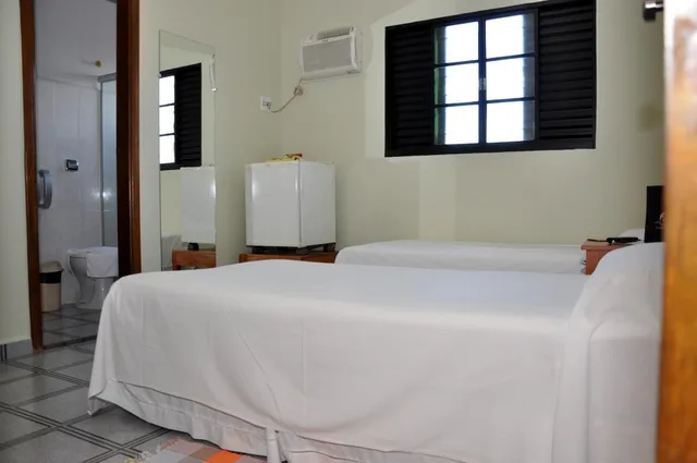 غرفة قياسية رباعية بسرير مزدوج وسريرين منفصلين، Carolina Plaza Hotel 4/7