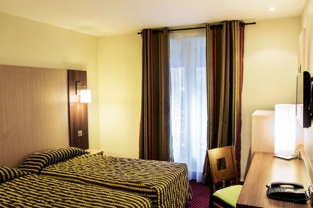 غرفة تنفيذية بسريرين منفصلين، HOTEL TERMINUS MONTPARNASSE 4/10