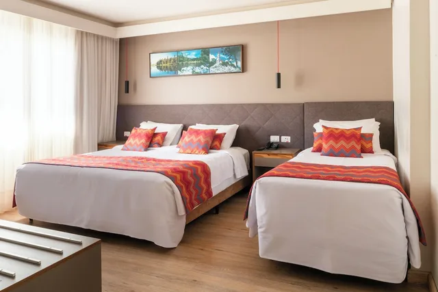 Stilo, Triple, 1 Double and 1 Single Bed، Laghetto Stilo Centro Hotel 1/9