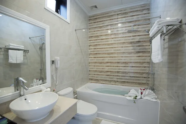 جناح بسريرين منفصلين وسرير كوين بإطلالة على البحر، Thien Thanh Resort 7/8