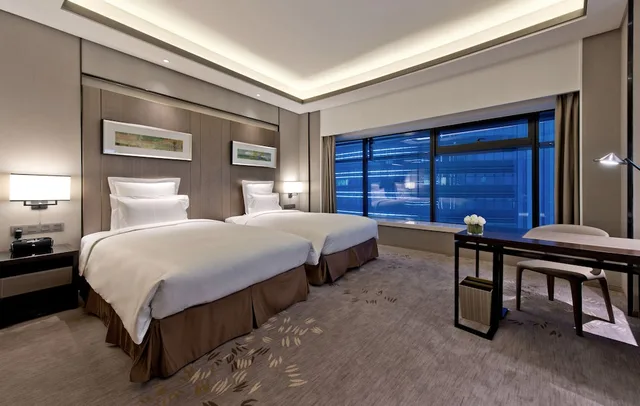 غرفة ديلوكس تنفيذية بسريرين منفصلين مع دخول صالة النادي في طابق مرتفع، Pullman Shanghai Xuhui (ex Pullman Shanghai South) 1/3