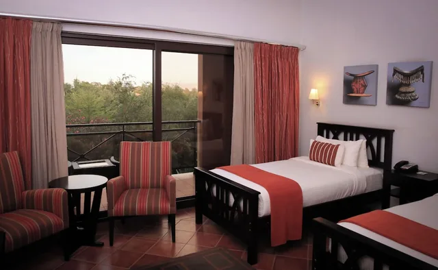 غرفة بسريرين منفصلين بإطلالة على الحديقة، Haile Resort Hawassa 3/9