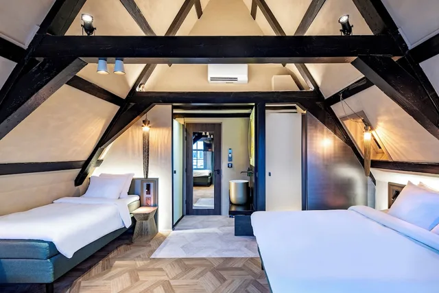 غرفة رباعية بسرير كوين وسريرين منفصلين، Mister Highland Hotel 1/2
