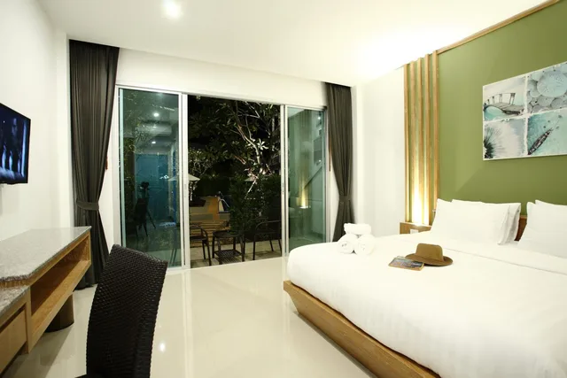 غرفة بسرير مزدوج بإطلالة على الحديقة، The Malika Hotel 1/1