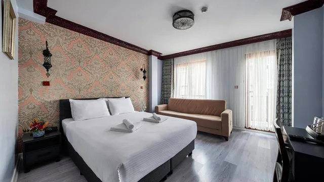 غرفة ديلوكس ثلاثية بإطلالة جزئية على البحر، Mytra Hotel 4/10