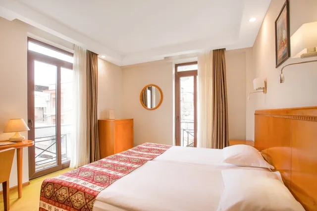 غرفة قياسية بسريرين منفصلين، Urban Boutique Hotel 1/3