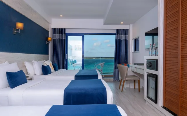 Deluxe Quadruple Room Seaview with Balcony-Transfer Excluded، Kaani Palm Beach 2/7