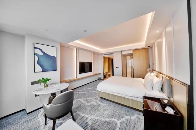 غرفة بزنس بسرير كينج وسرير كوين، Nanjing Shuguang International Hotel 1/1