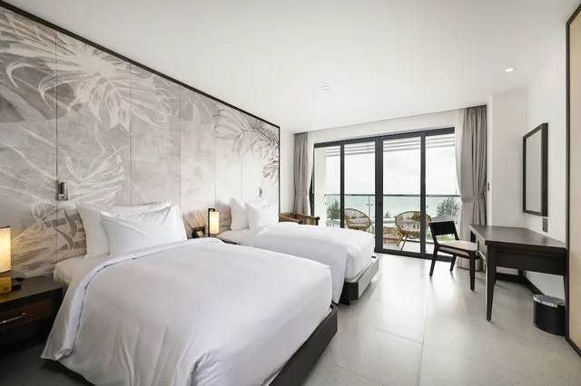 غرفة ديلوكس بسريرين منفصلين بإطلالة على البحر، Emerald Ho Tram Resort 2/3