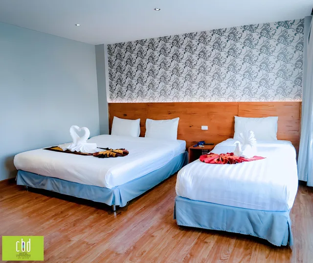 غرفة ثلاثية بسرير كينج وسرير فردي، Cbd Hotel Suratthani 2/3