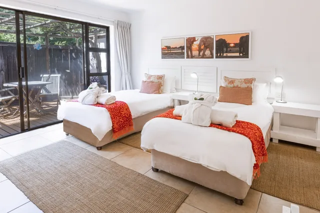 غرفة قياسية بسريرين منفصلين، Sandals Guest House 1/10