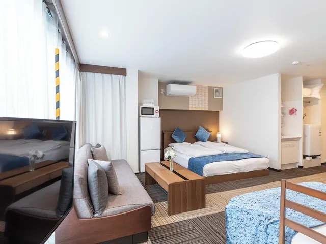 غرفة عائلية بسريرين منفصلين وسرير كينج وسرير فردي مع أريكة، Sakuragawa Riverside Hotel 8/10