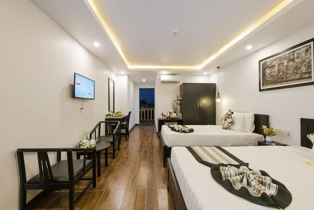 جناح متصل جونيور بسرير فردي بإطلالة على النهر، Gem Riverside Hotel Hoi An 1/2