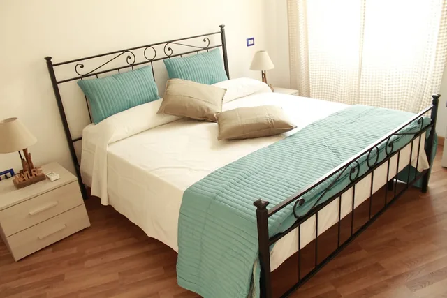 جناح عائلي بسرير كوين وسريرين منفصلين مع أريكة، Corso Italia Suites 2/10