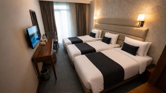 غرفة عائلية بسرير كوين وسرير فردي بشرفة، Istanbul Midpoint Hotel 5/10