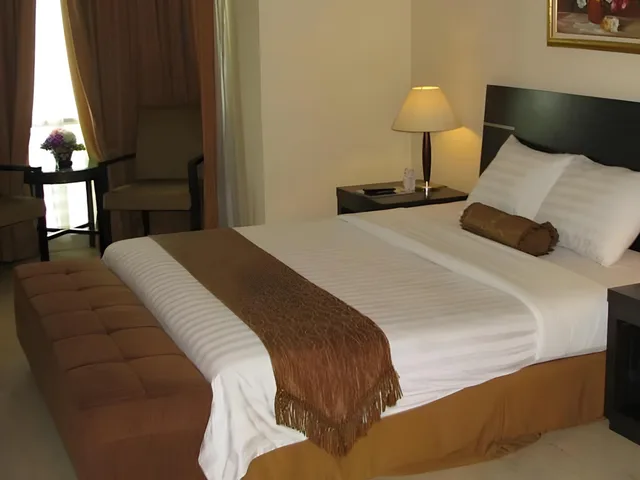 جناح غراند بسرير مزدوج مع أريكة، Grand Asia Hotel 1/1