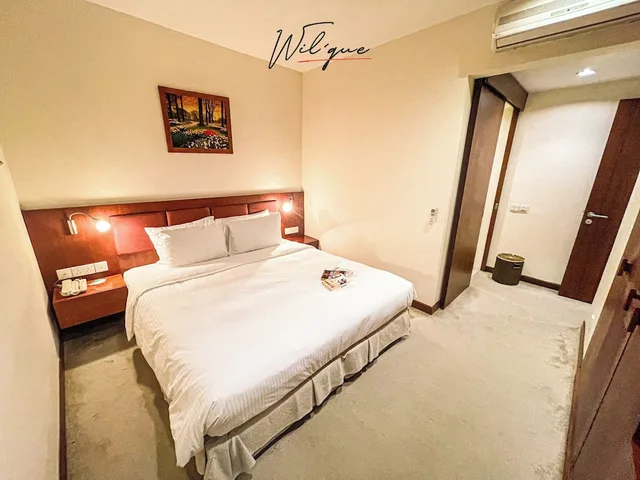 غرفة ديلوكس بسرير كينج وسرير كوين بغرفتي نوم، Wil'que Westlake Hotel & Residences 1/10