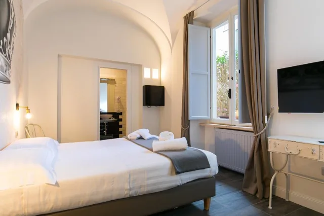 غرفة ديلوكس بسرير كوين، Trevi Contemporary Suite 8/10