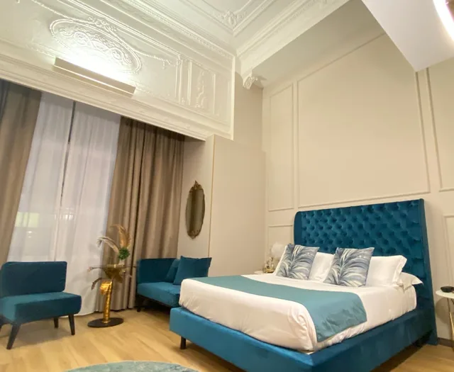 جناح ديلوكس بسرير كوين وسرير فردي، Intomilan Aparthotel Galleria Duomo 2/3