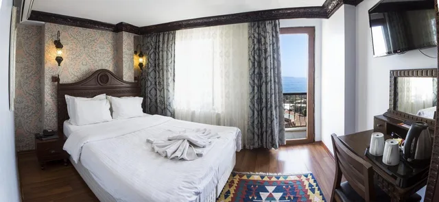 غرفة ديلوكس ثلاثية بإطلالة جزئية على البحر، Mytra Hotel 5/10