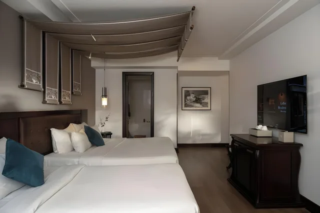غرفة بريميوم ثلاثية بسرير فردي، The Odys Boutique Hotel 1/2