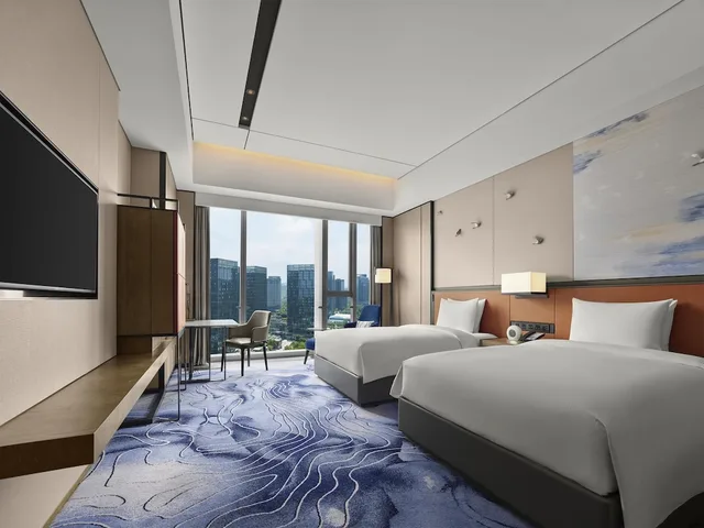 غرفة بسريرين منفصلين في طابق مرتفع، Hilton Guiyang Hotel 1/10