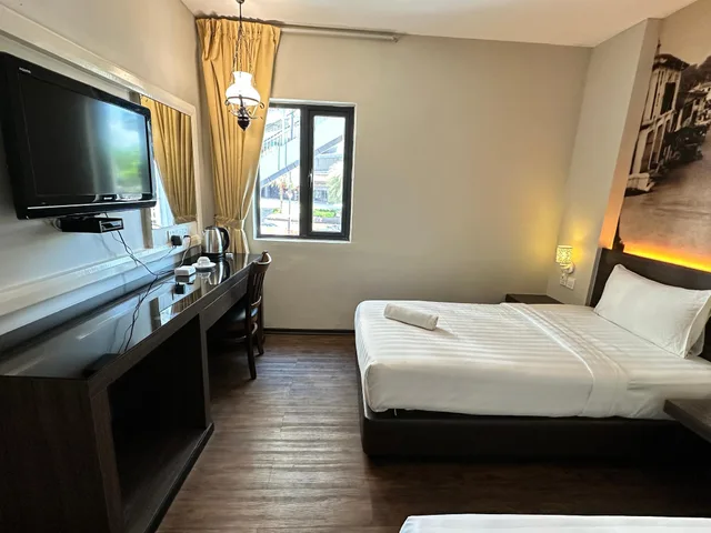 غرفة سوبيريور ثلاثية بسرير كوين وسرير فردي، The Grand Jade Hotel 1/1