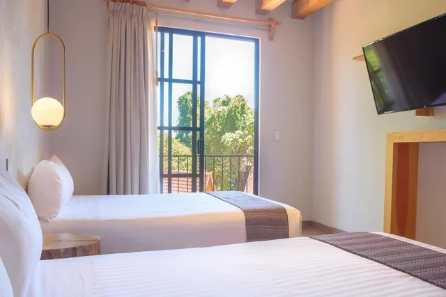 غرفة بسريرين منفصلين، Zirahuen Forest And Resort 2/5