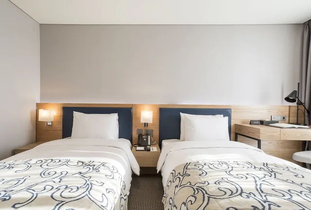غرفة ديلوكس بسريرين منفصلين، Centum Primus Hotel 1/5
