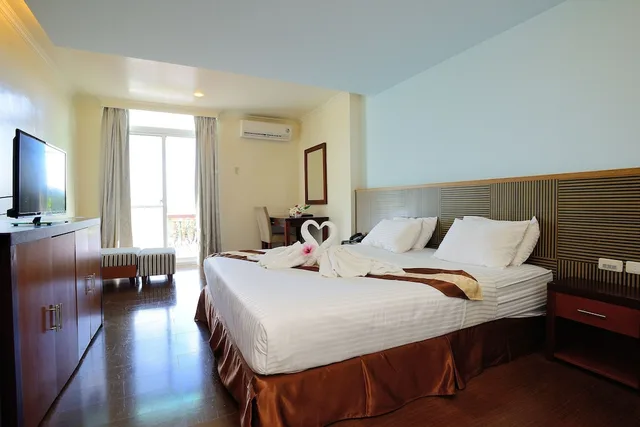 غرفة قياسية بسرير كينج بإطلالة على البحر، Airai Water Paradise Hotel And Spa 1/3