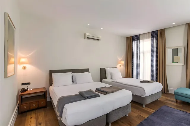 غرفة قياسية ثلاثية بسرير فردي، Misafir Suites 8 Istanbul. 1/1