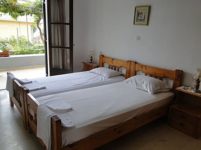 شقة بسريرين منفصلين بغرفة نوم واحدة مع أريكة، Paradise Inn 1/2
