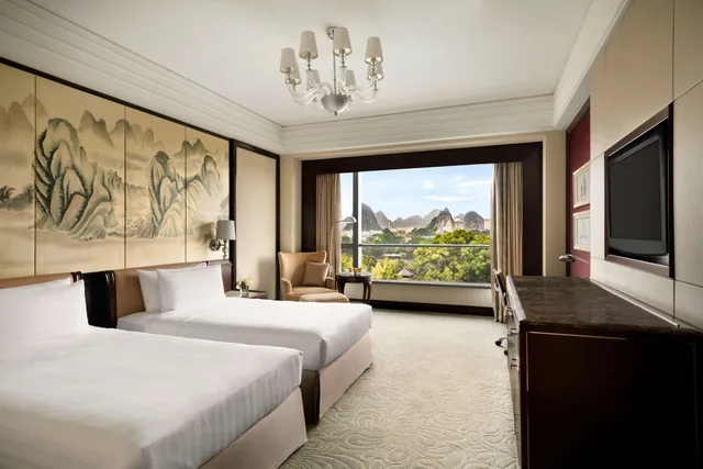 غرفة ديلوكس بسريرين منفصلين بإطلالة على النهر، Shangri La Guilin 1/6