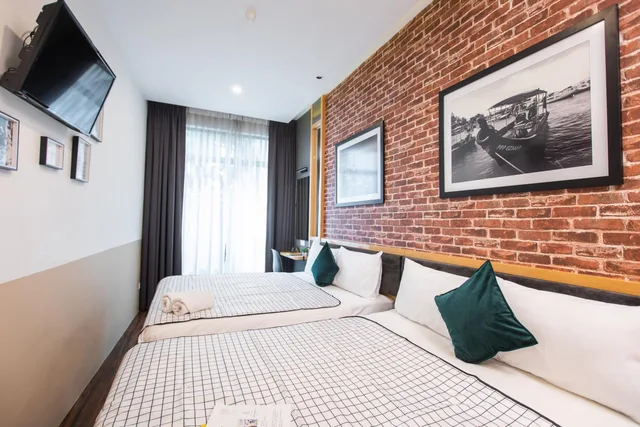 غرفة ديلوكس رباعية بسريرين كوين، B Street Hotel 1/1