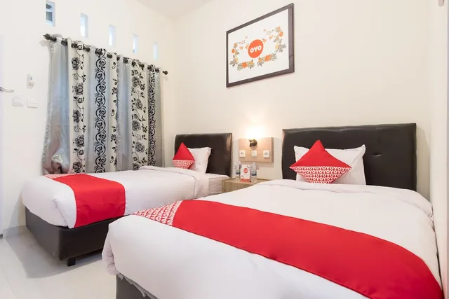 غرفة قياسية بسريرين منفصلين، OYO 873 Kamani Homestay Syariah 2/5