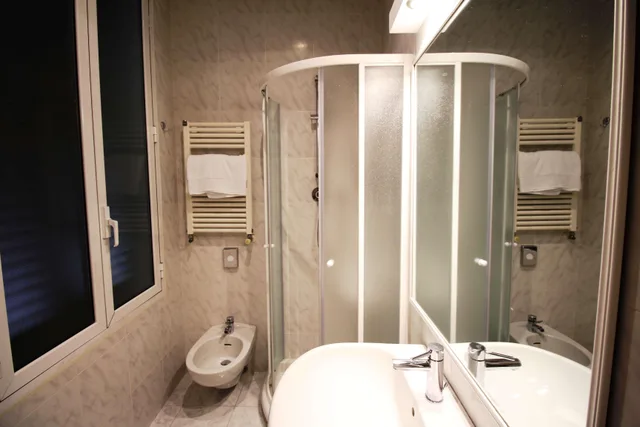 غرفة سوبيريور بسرير كوين وسرير فردي بمنطقة جلوس، Best Western Hotel Moderno Verdi 6/6