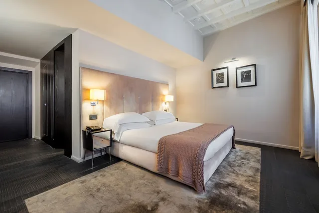غرفة ديلوكس بسرير كينج، DOM Hotel Roma 3/4