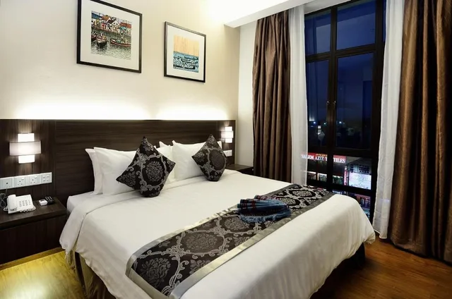 جناح بسرير كينج مع أريكة، Holiday Villa Hotel and Suites Kota Bharu 1/2