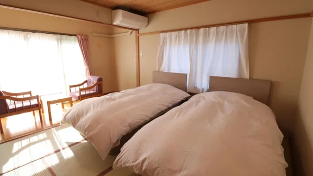غرفة يابانية بسريرين منفصلين بأرضية تاتامي، Kuroiwa Ryokan 1/1
