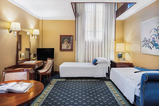 جناح بسرير كينج وسريرين منفصلين، Starhotels Du Parc 4/11