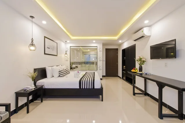 غرفة ديلوكس بسريرين منفصلين بشرفة، Gem Riverside Hotel Hoi An 3/10
