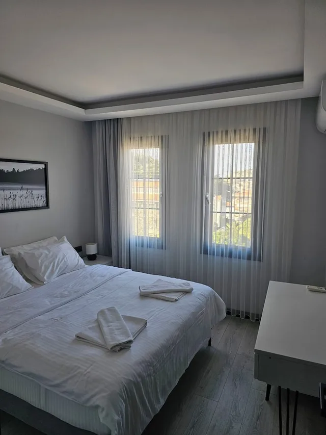 شقة عائلية بسرير كوين وسرير فردي مع أريكة، Cicek Apart Hotel 3/10