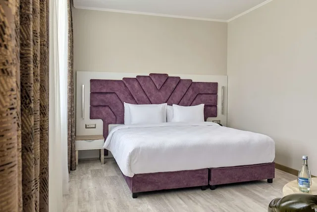 Premium, King Bed, Panarams Tashkent Hotel a Member of Radisson Individuals 1/4