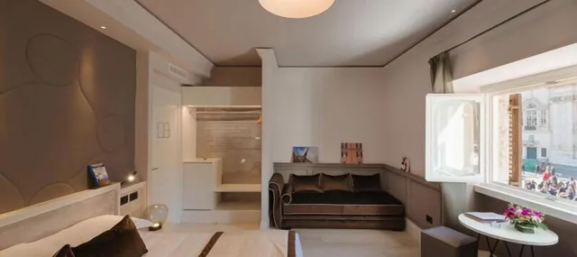 غرفة ديلوكس ثلاثية بسرير كينج مع أريكة، Rhea Silvia Luxury Navona 3/3