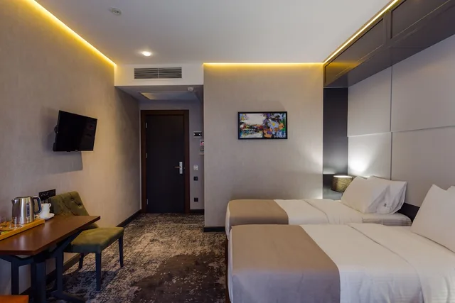 غرفة ديلوكس بسريرين منفصلين، Tapis Rouge Design Boutique Hotel 3/5