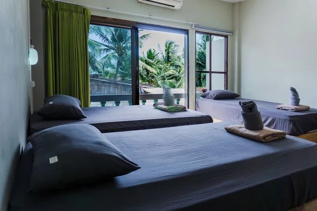 سكن مشترك مختلط بثلاثة أسرّة، Echo Beach Backpackers 1/2
