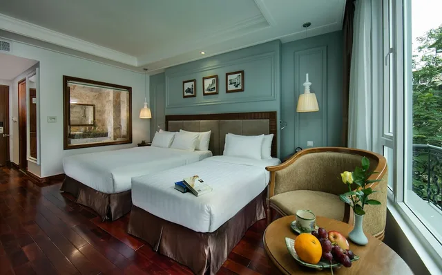 غرفة ديلوكس ثلاثية بسرير كوين وسرير فردي بإطلالة على المدينة، Hanoi Pearl Hotel 10/10