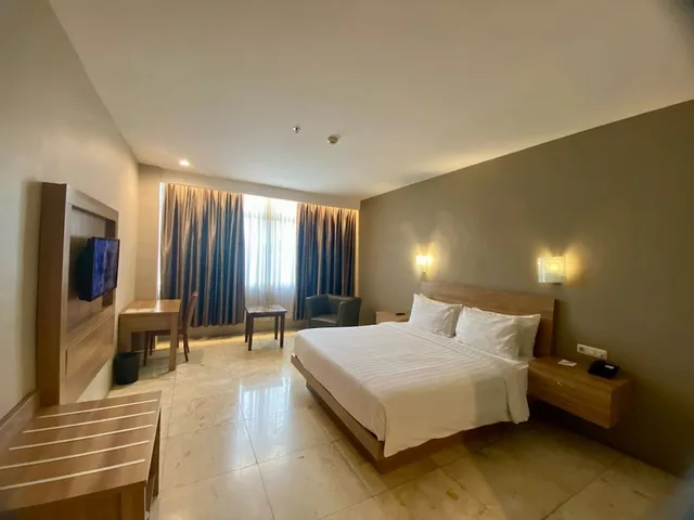 غرفة تنفيذية بسرير كوين، Manna Hotel Pematangsiantar 2/3